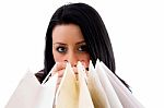 Front View Of Model Carrying Shopping Bags On White Background Stock Photo