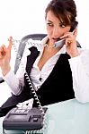 Front View Of Service Provider Communicating On Phone Stock Photo