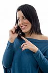 Front View Of Smiling Female Talking On Mobile On White Background Stock Photo