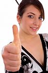 Front View Of Smiling Japanese Woman Showing Thumbs Up Stock Photo