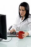 Front View Of Working Woman Holding Mug On White Background Stock Photo