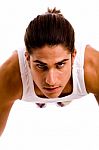 Front View Of Young Man Doing Pushups Stock Photo