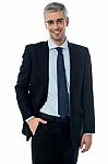 Full Length Portrait Of A Young Businessman Standing Stock Photo