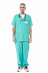 Full Length Portrait Of Young Male Doctor Stock Photo
