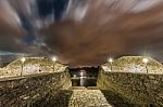 Full Moon Night Among Clouds From The Town Of Ribadeo, Spain Stock Photo