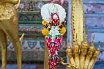 Garland To Worship Buddha Statue Stock Photo