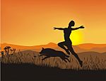 Girl at sunset with dog Stock Photo