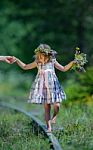 Girl Balancing On Rails Stock Photo