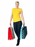 Girl Carrying Shopping Bags Stock Photo