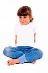 Girl Child Sitting With Leg Crossed Stock Photo