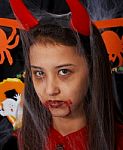 Girl Dressed Up As Devil Stock Photo