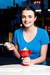 Girl Enjoying Tempting Dessert Stock Photo