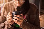 Girl Holding A Coffee At Work Stock Photo