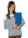 Girl Holding Documents And Posing Stock Photo