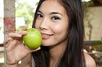 Girl Holding Green Apple Stock Photo