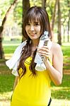 Girl Holding Water Bottle Stock Photo