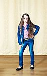 Girl In A Blue Denim Suit Stock Photo