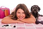 Girl In Swimsuit At The Beach With Dog Stock Photo