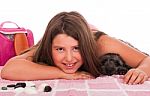 Girl In Swimsuit At The Beach With Dog Stock Photo