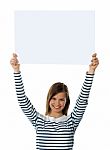 Girl Lifting Blank Placard High Stock Photo