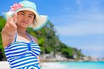 Girl On The Beach At Thailand Stock Photo