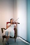 Girl Playing Violin Stock Photo