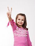 Girl Showing Victory Sign Stock Photo