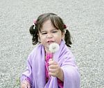 Girl With Dandelions Stock Photo