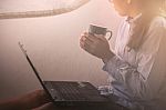 Girls Are Drinking Coffee In Room Stock Photo