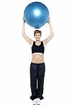 Glamorous Woman Doing Pilates Exercise Stock Photo