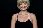 Glamorous Woman In Sleeveless Black Spaghetti Top Stock Photo