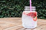 Glass Of Iced Strawberry Soda Drink Stock Photo