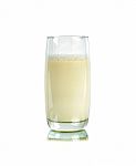 Glass Of Milk Isolated On The White Background Stock Photo