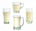 Glass Of Milk Isolated On The White Background Stock Photo