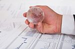 Globe With Chart Papers Stock Photo