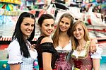 Gorgeous Young Women At German Funfair Stock Photo