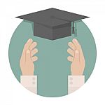 Graduation Cap In Hand Stock Photo