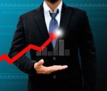 Graphs On The Hands Of Businessmen Stock Photo