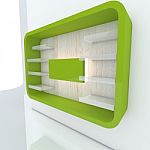 Green Shelf On White Wall Stock Photo