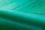 Green Silk On A Warping Loom Of A Textile Mill Stock Photo