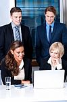Group Of Business Executives At Office Stock Photo