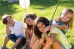 Group Of Childrens Having Fun In The Park Stock Photo