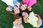 Group Of Childrens Having Fun In The Park Stock Photo