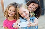 Group Of Childrens Taking A Selfie In The Park Stock Photo