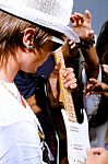 Guitarist Performing For Fans Stock Photo