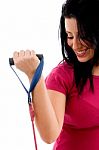 Half-length View Of Female Exercising With Rope On White Background Stock Photo