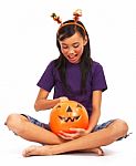 Halloween Girl Getting Treat Stock Photo