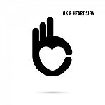 Hand And Heart Shape Abstract Logo Design Stock Photo