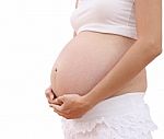 Hand Hold Abdomen Of Pregnant Woman On White Background Stock Photo