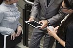 Hands Of A Casual Man Holding A Digital Tablet Stock Photo